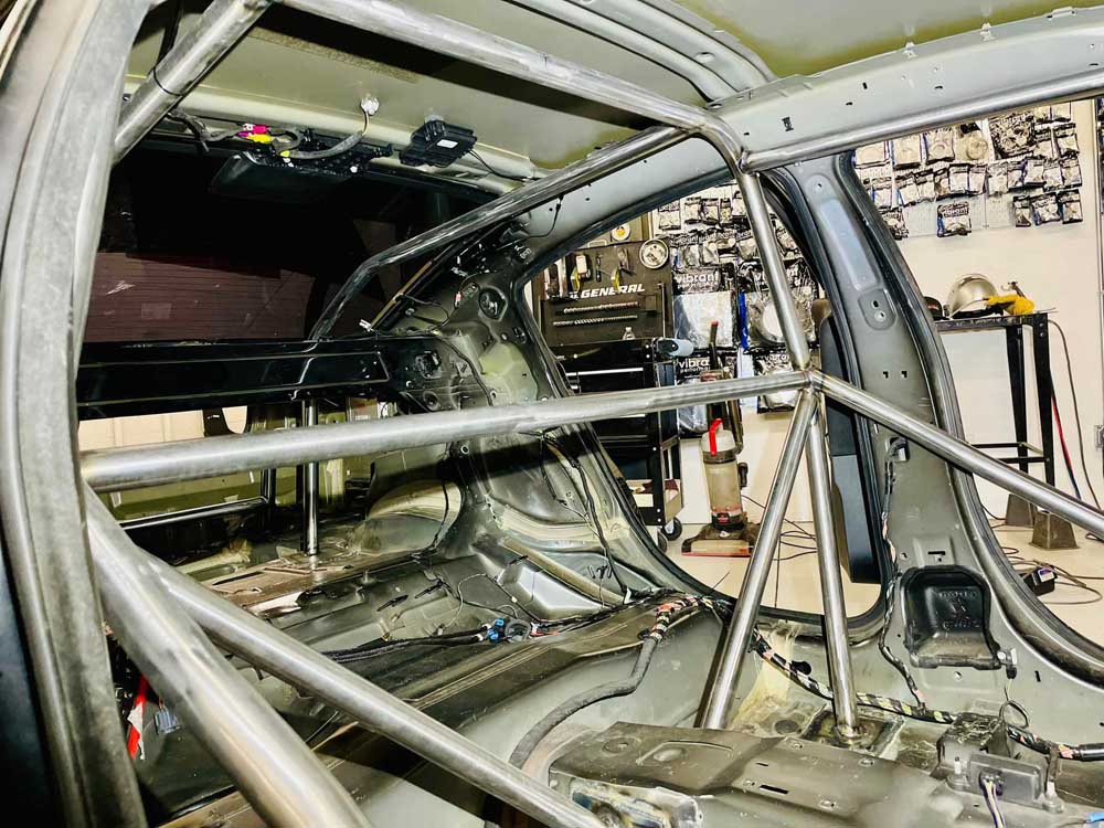 Cage Installation NHRA-Certified Roll Cage Fabrication and Installation | Hochman Fabric ...